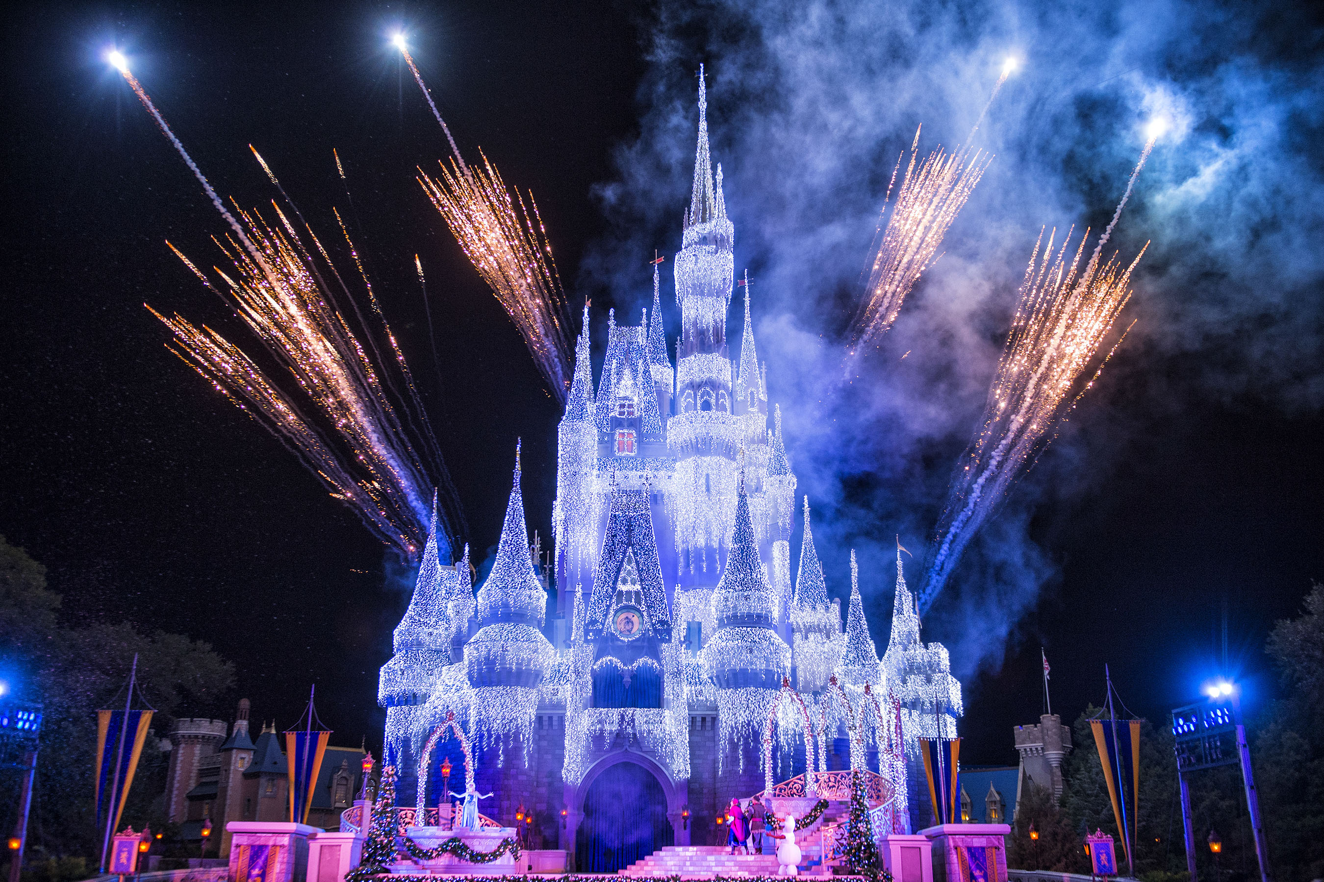 Watch as Queen Elsa Transforms Cinderella Castle for the Holidays